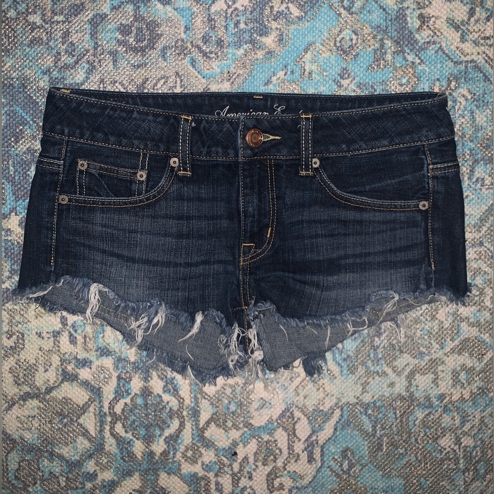 Dark wash distressed American Eagle shorts